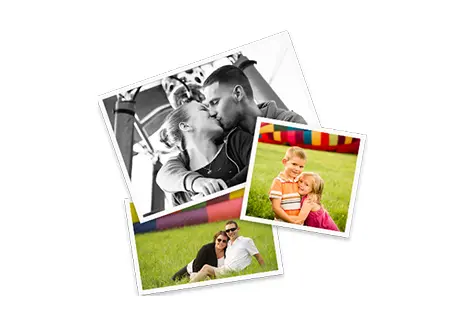 A couple is kissing in the grass with two pictures of them.