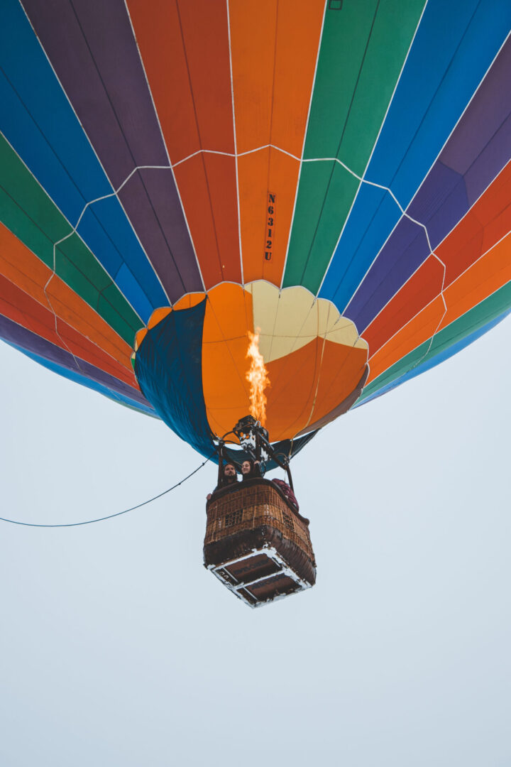 A person in the air on a balloon